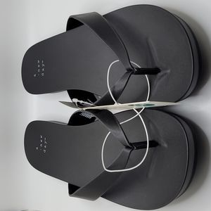 A New Day black flip flops